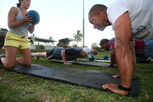 Prime Minister Tony Abbott doing physical training with members of the Bamaga community, during his visit to Cape York, on Friday 28 August 2015. 