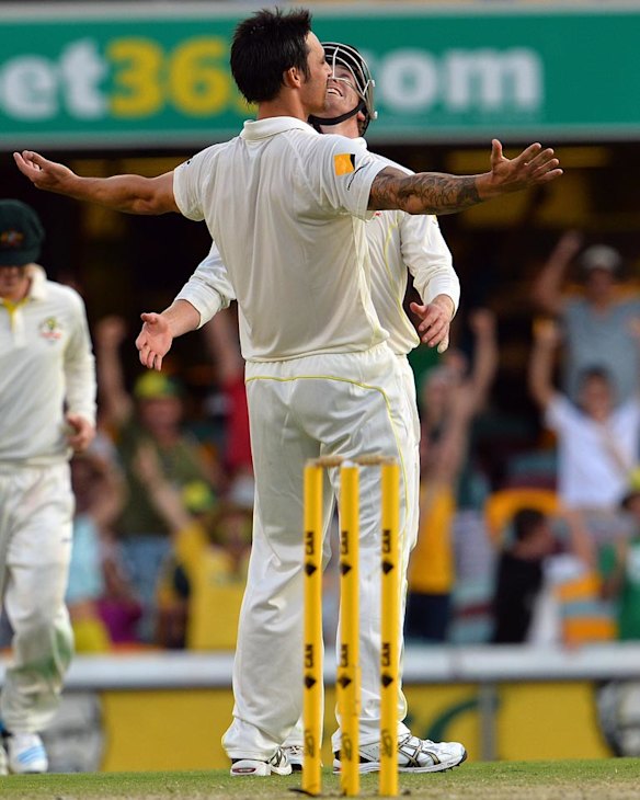 Mitchell Johnson and George Bailey celebrate winning the first Test.