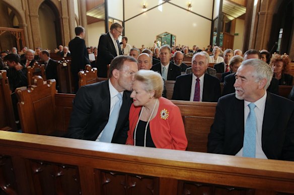 Opposition Leader Tony Abbott greets Liberal MP Bronwyn Bishop, at the service at the Church of St Andrew to mark the start of the 2013 Parliamentary year, in Canberra on Tuesday 5th of February 2013. 