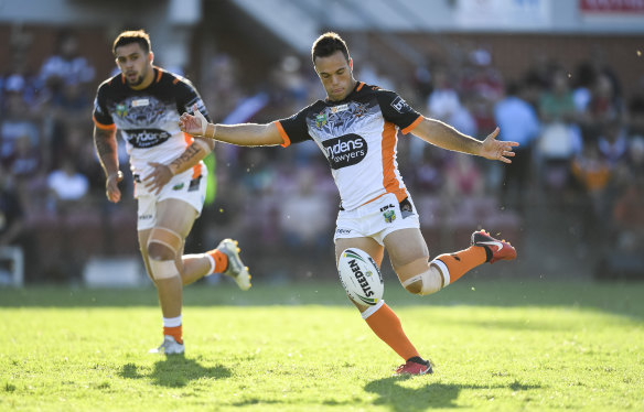Taking charge: Tigers halfback Luke Brooks turned in a season best performance against Manly on Sunday.