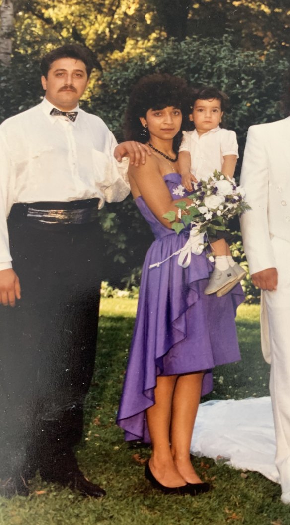 First the dress, then the rest: Young Deni Todorovic with their father Rocky (left) and mother, Maca, wearing the coveted purple taffeta.