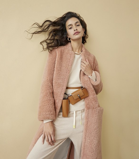 H Brand coat, Bassike knit and track pants, Reliquia jewellery and Zegna bag.