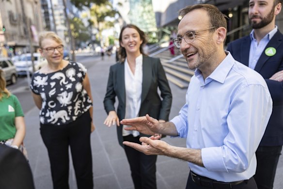 Adam Bandt with Senator Janet Rice and Greens lower house candidate Steph Hodgins-May after the election was announced.