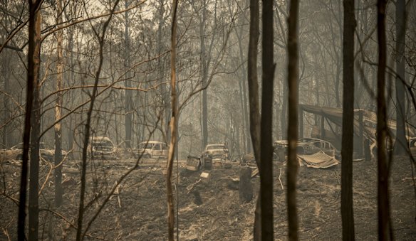 Burnt out vehicles on the fireground in Taylors Arm near Macksville in northern NSW.