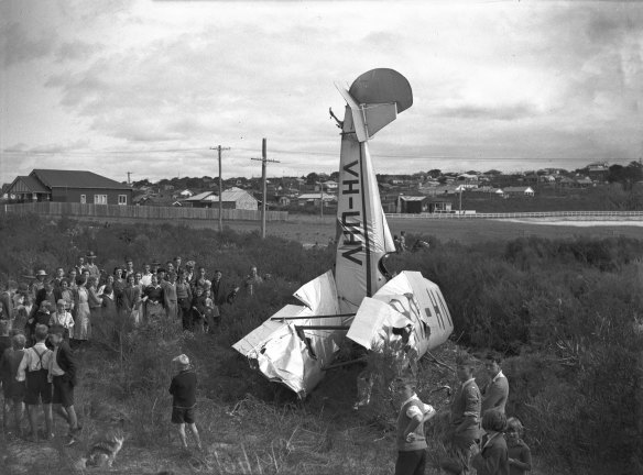 The damaged beach patrol plane in Harbord, April 14, 1935.