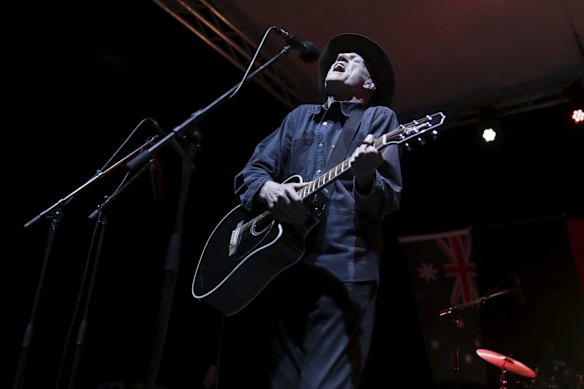 Peter Garrett from Midnight Oil performs at the community event.