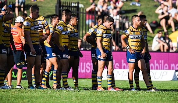 Dark day: The Eels assume regular position behind their try line.