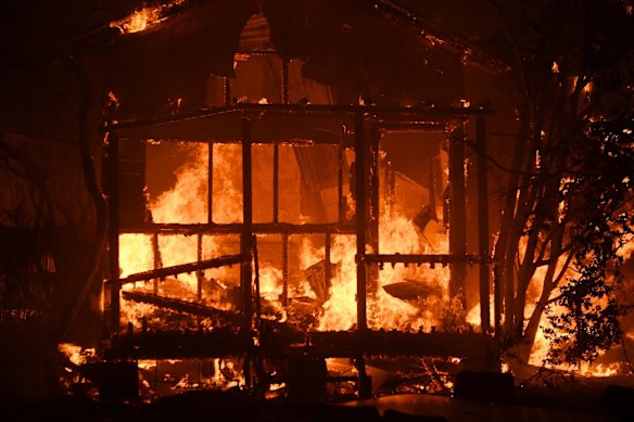 As night falls on Bilpin , it's apparent several homes have been lost along the Bells Line of Road, December 21, 2019. 