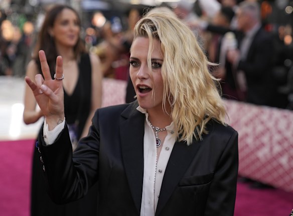 Kristen Stewart arrives in a tuxedo jacket.