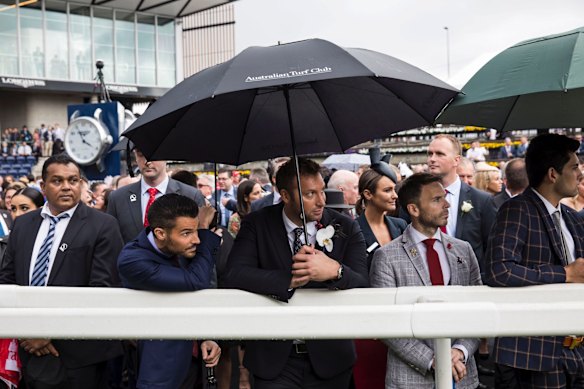 Ryan Channing and boyfriend Ian Thorpe in the mounting yard at the TAB Everest horse race.