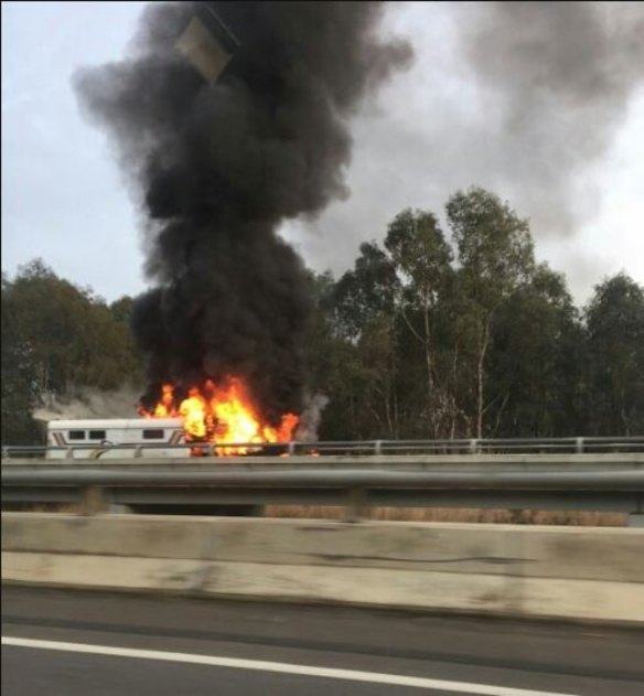 The horse float on fire which has closed the Hume Freeway.