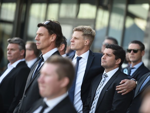 
Nick Reiwoldt comforts Leigh Montagna during the lap of honour.