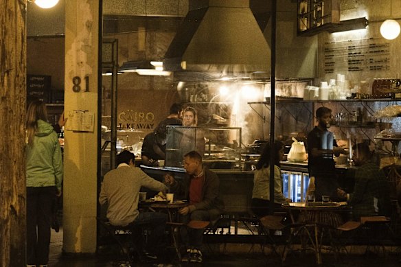 Diners eat out on the first night of eased lockdown conditions in Newtown.