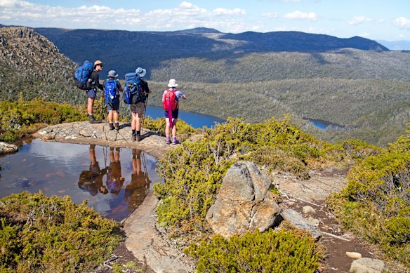 TARN SHELF: The Tarn Shelf is exactly what the label on the tin suggests - a flat shelf of land high among the peaks of Mt Field National Park speckled with gorgeous lakes. The circuit walk across the shelf begins at Lake Dobson - the end of the road into the mountains - climbing past the Mt Mawson ski lodges to emerge into alpine heights. The trail weaves between the lakes of the Tarn Shelf, each one seemingly a different colour and all trimmed with gold in autumn when the deciduous native fagus trees get their glow on. The walk descends past a dilapidated old ski hut on Twilight Tarn before swinging back to Lake Dobson.