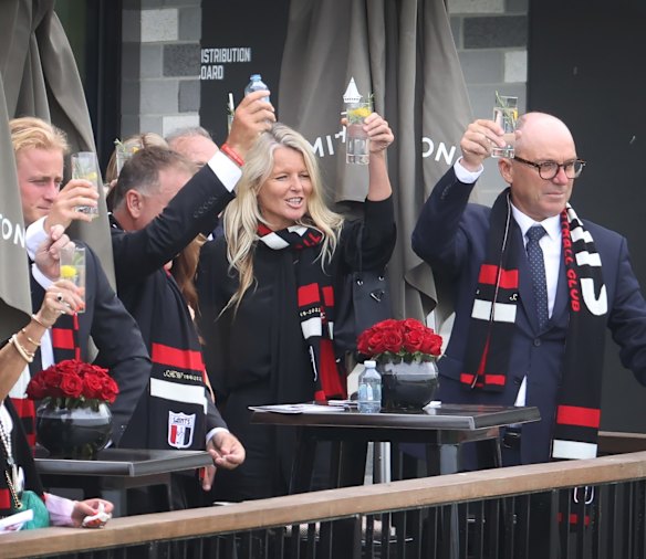 Warne's ex-wife Simone Callahan raises her glass with guests to salute Shane.