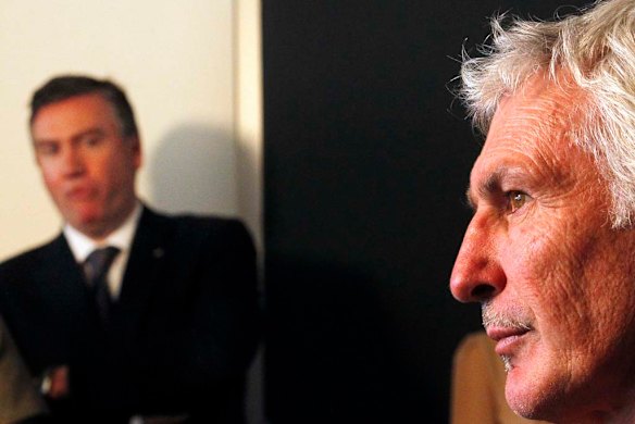 Magpies President Eddie McGuire looks on as Collingwood coach Mick Malthouse speaks to the media during a press conference, 16 August 2011.