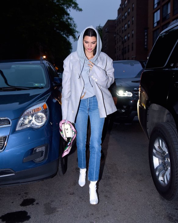 Kendall Jenner bought her XXXL coat just to fit over her hoodie.