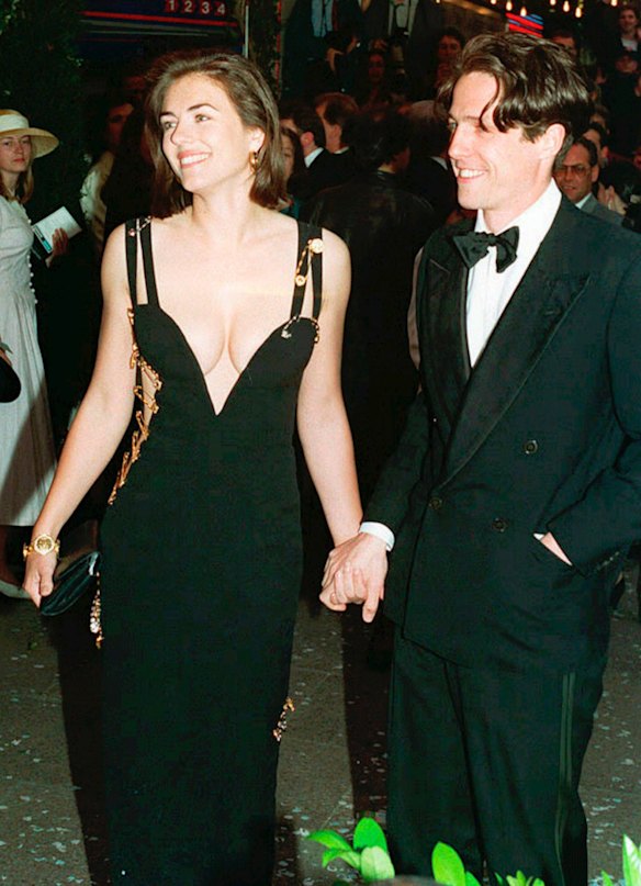 Elizabeth Hurley, premiere of 'Four Weddings and a Funeral', 1994. 'This safety pin gown is probably one of Gianni Versace's most memorable pieces and one of Liz Hurley's most memorable fashion moments. She and Hugh Grant were the 'it' beautiful couple of London and this image is now iconic.  It was such a daring dress but she pulled it off perfectly.'