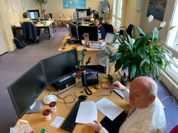 High Commissioner George Brandis during a shift taking calls from Australians in Britain affected by the coronavirus crisis. 