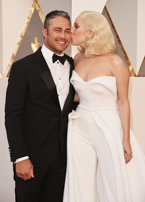 Lady Gaga, 30, and Taylor Kinney, 35, ended their engagement (Bad Romance) in July after five years together.
According to People, they decided to end things as "work kept them apart a lot".
They met after he was hired as an actor for the music video for her song You and I in 2011. The pair played lovers in the music video, in which Gaga wore her mother's wedding dress.
The Vampire Diaries actor proposed on Valentine’s Day last year with a heart-shaped diamond. 