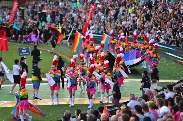 The parade makes its way around the outside of the SCG.