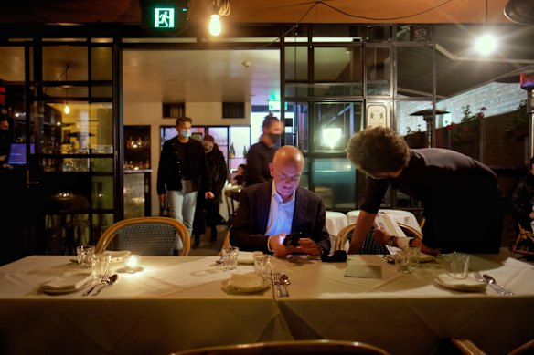 People enjoying the first hour of restaurants re-opening at the The Supper Club in Melbourne at midnight.