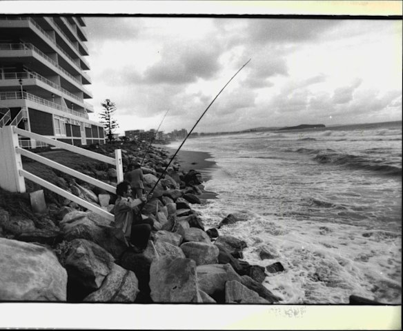 Greg Hughes, of Mona Vale (nearest camera) and his brother, Gary, of Dee Why, fishing near Weatherill St, Collaroy. June 20, 1978. 