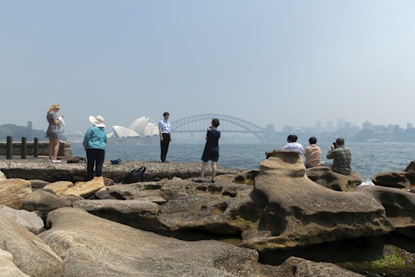 Smoke haze settles in Sydney Harbour. 