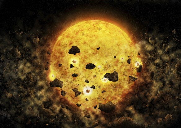 This illustration provided by NASA depicts debris surrounding the star RW Aur A, about 450 light years from the Earth. Astronomers said they may have caught the star munching on a planet or mini-planets. 