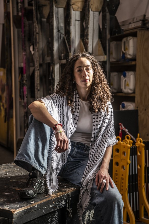 Actress Violette Ayad, who has vowed to wear the keffiyeh for the remaining season of Oil during the curtain call.