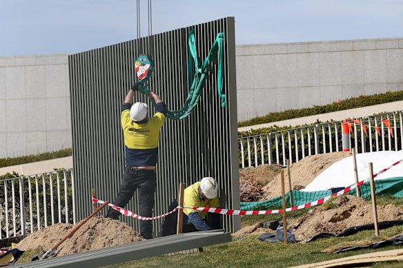 A security fence is installed across the lawns of Parliament House in Canberra on Tuesday 12 September 2017.