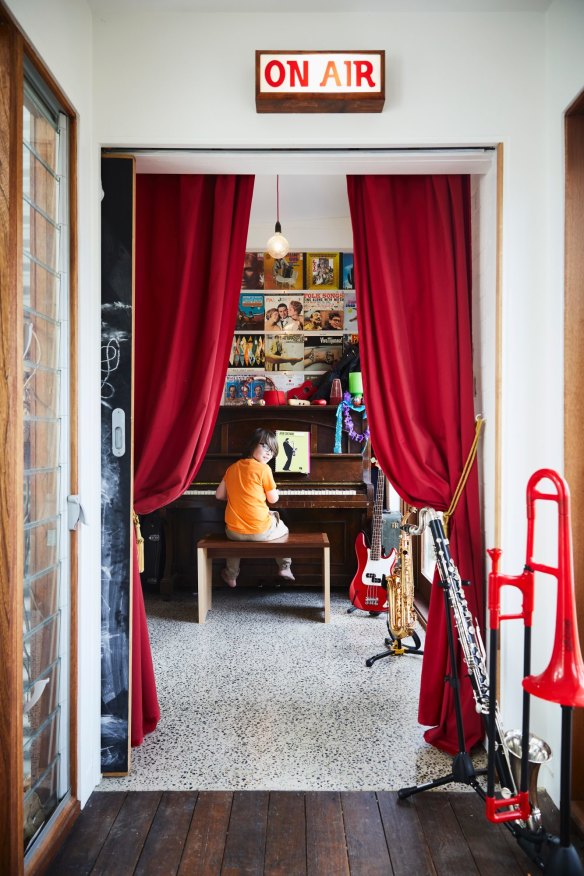 A sense of fun and theatre reigns throughout the home. “I had such fun decorating the music room,” says Ruth, who used favourite LPs as wall art.