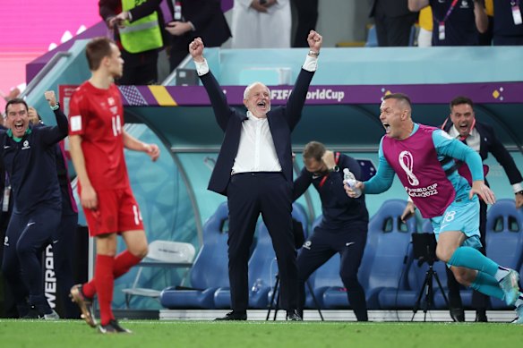 Australian coach Graham Arnold celebrates a famous win.