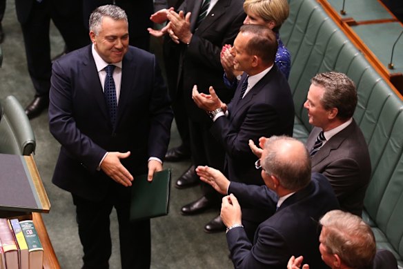 Joe Hockey is congratulated after delivering his more politically palatable second budget.