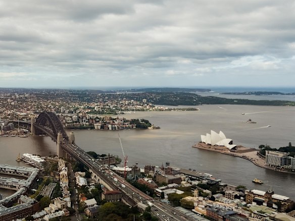 Sydney Harbour looking brown due to storm water run off and sediment after recent record storms, as seen from the Sky Deck at Crown Casino