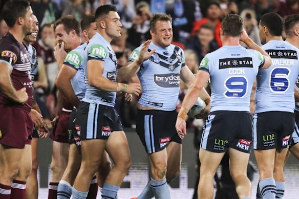 Josh Morris of the Blues scores a try.