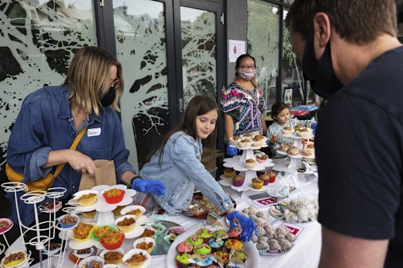 Cakes for sale at Bourke Street Public School as voting continues in the NSW local council elections.