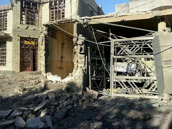 Destroyed buildings in the streets of Fallujah, a city under the control of the Islamic State, also known as ISIS. Fallujah, Iraq.