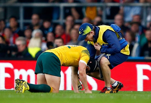 In a world of pain: Matt Giteau after a tackle went wrong.