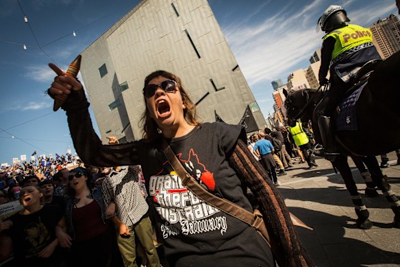 Rally against racism  protestors clash with Reclaim Australia protestors at Federation Square under a huge police presence  on April 4, 2015 in Melbourne, Australia.