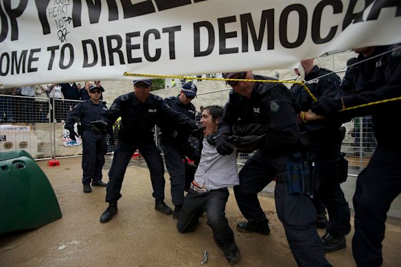 Police attempt to put an end to the Occupy Melbourne protest in the City Square today.