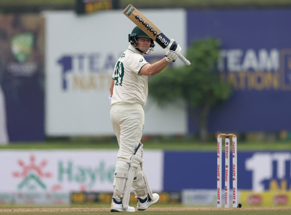 Steve Smith celebrates scoring run No.10,000.