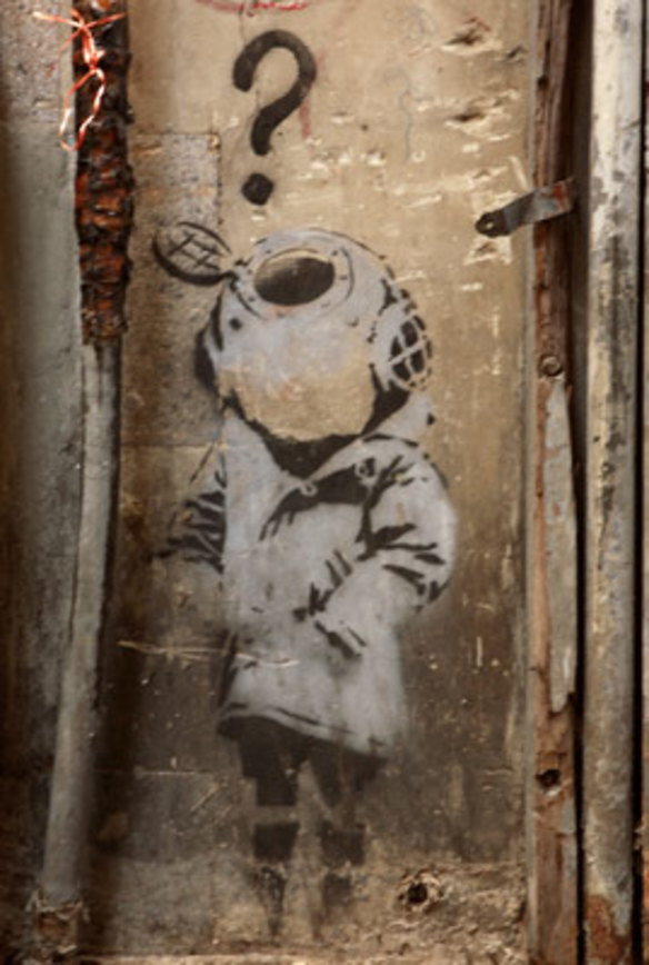 An original by the street artist Banksy in one of Melbourne's lanes.