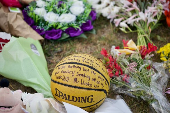 Hillcrest Primary School sport teacher Jayden Wicks left a handwritten message on a basketball nestled among the flowers. “Thank you for being part of my first ever teaching gig. You guys made teaching fun,” the tribute read. “I wish nothing but the best for your families.”