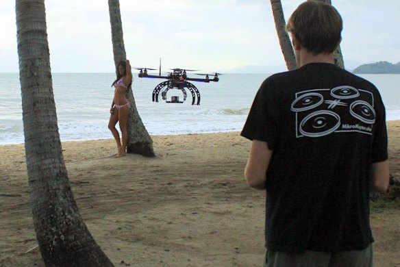 A flying drone is used during a fashion shoot.
