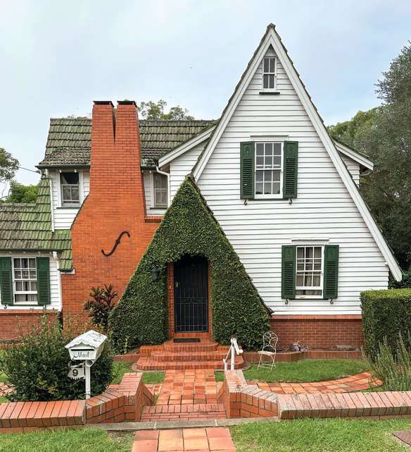 “It’s an A-frame, split chimney, Tudor-style combo with extra foliage - designed by Leo Joseph Drinan. Built in 1936, it’s a charming example of interwar modernism, intentionally different from the other joints being constructed at the same time,” writes Weir of this St Lucia house.