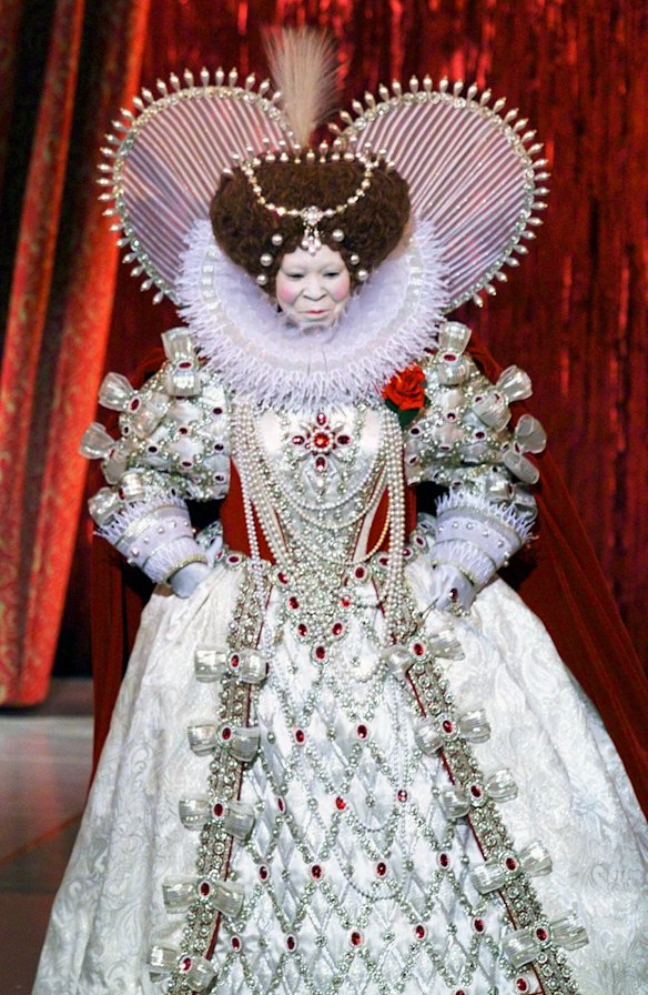 Host Whoopi Goldberg appears as Queen Elizabeth, in a Bob Mackie costume, during the 1999 Academy Awards.