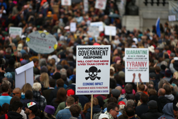 Demonstrators at an anti-mask rally in London's Trafalgar Square.