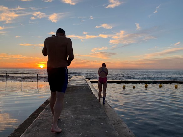 Early morning swimmers at Austinmer beach in Wollongong. 
