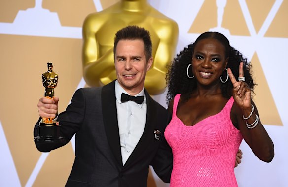 Sam Rockwell, winner of the award for best performance by an actor in a supporting role for <i>Three Billboards Outside Ebbing, Missouri</i>, and Viola Davis in the press room.